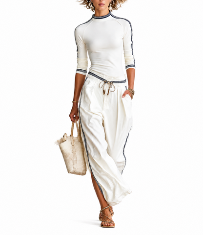 GIGI | Conjunto deportivo de dos piezas, pantalón con cuello alto.